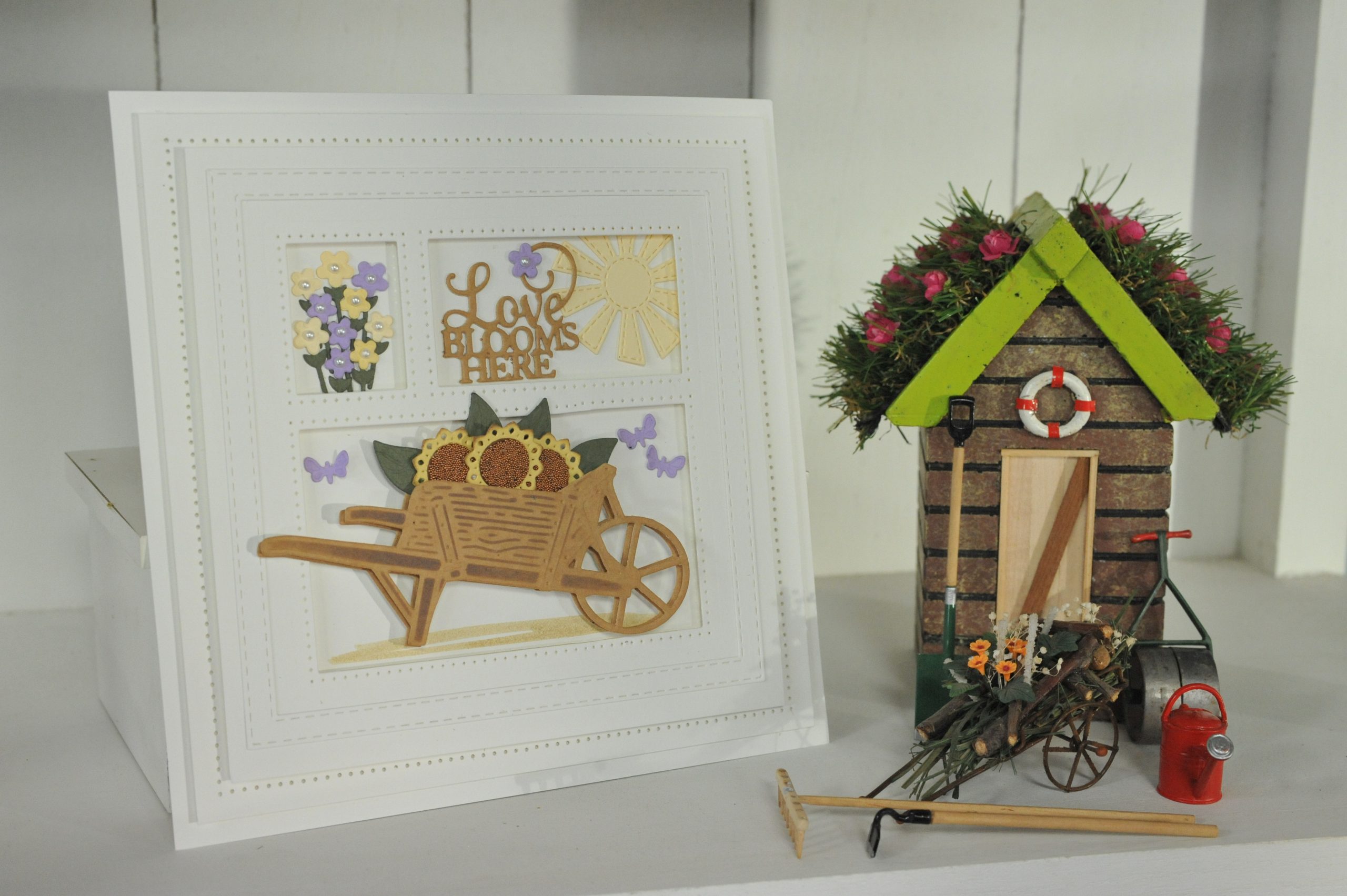 love blooms here shadow box wheelbarrow